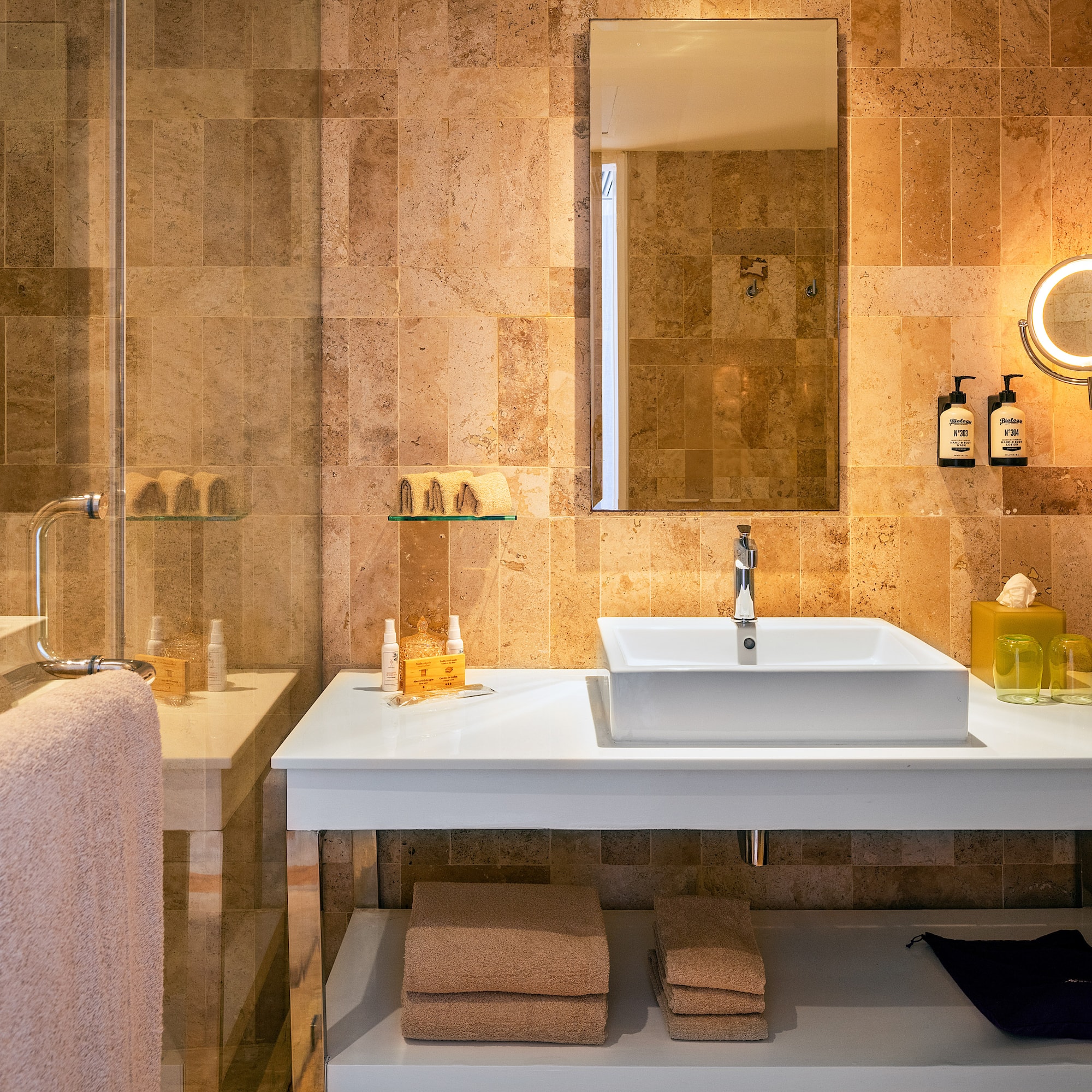 a bathroom with a mirror and sink