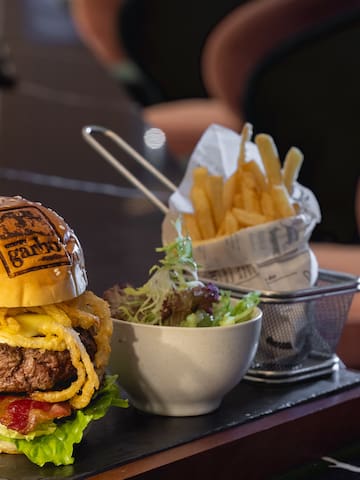 a burger and fries on a table