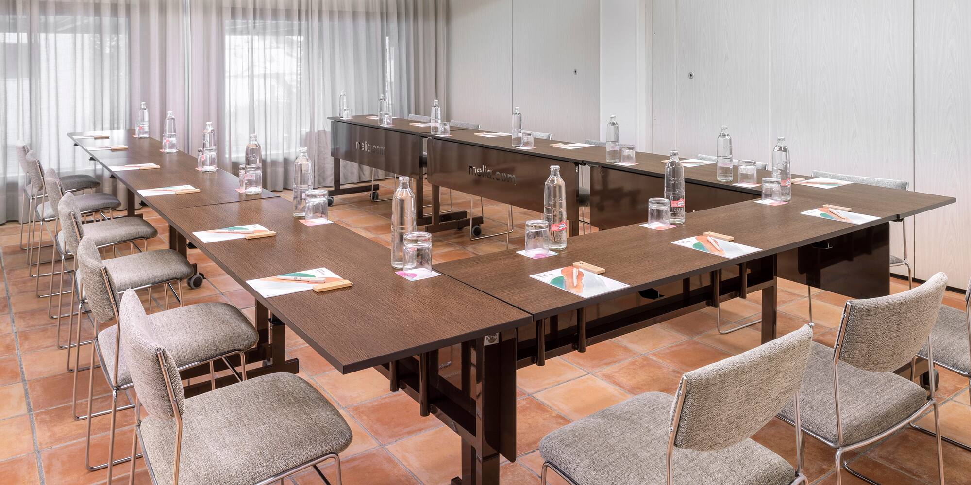 a conference room with chairs and tables