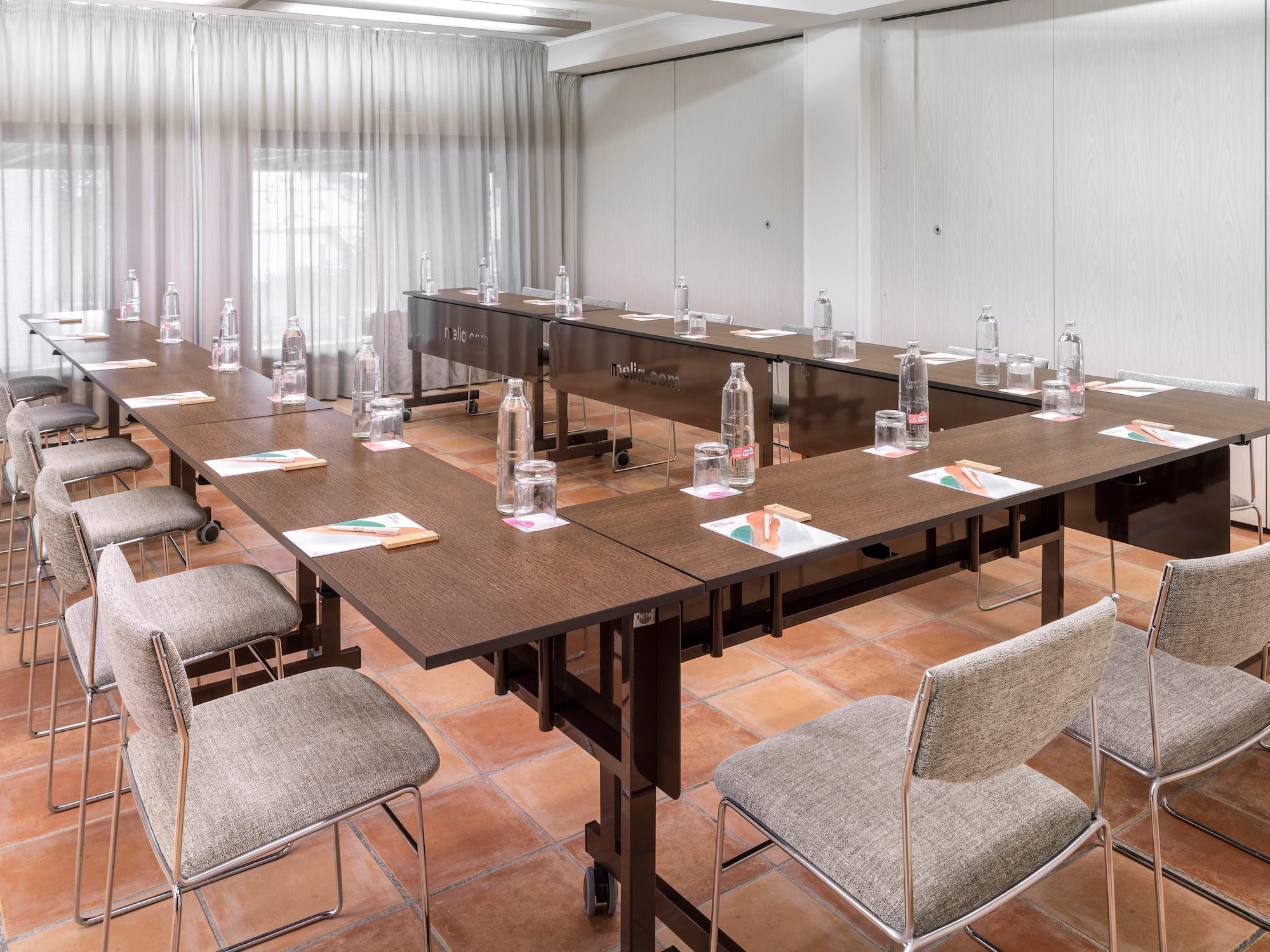 a conference room with chairs and tables
