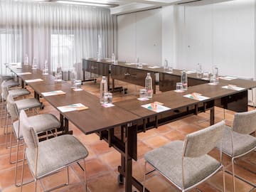 a conference room with chairs and tables