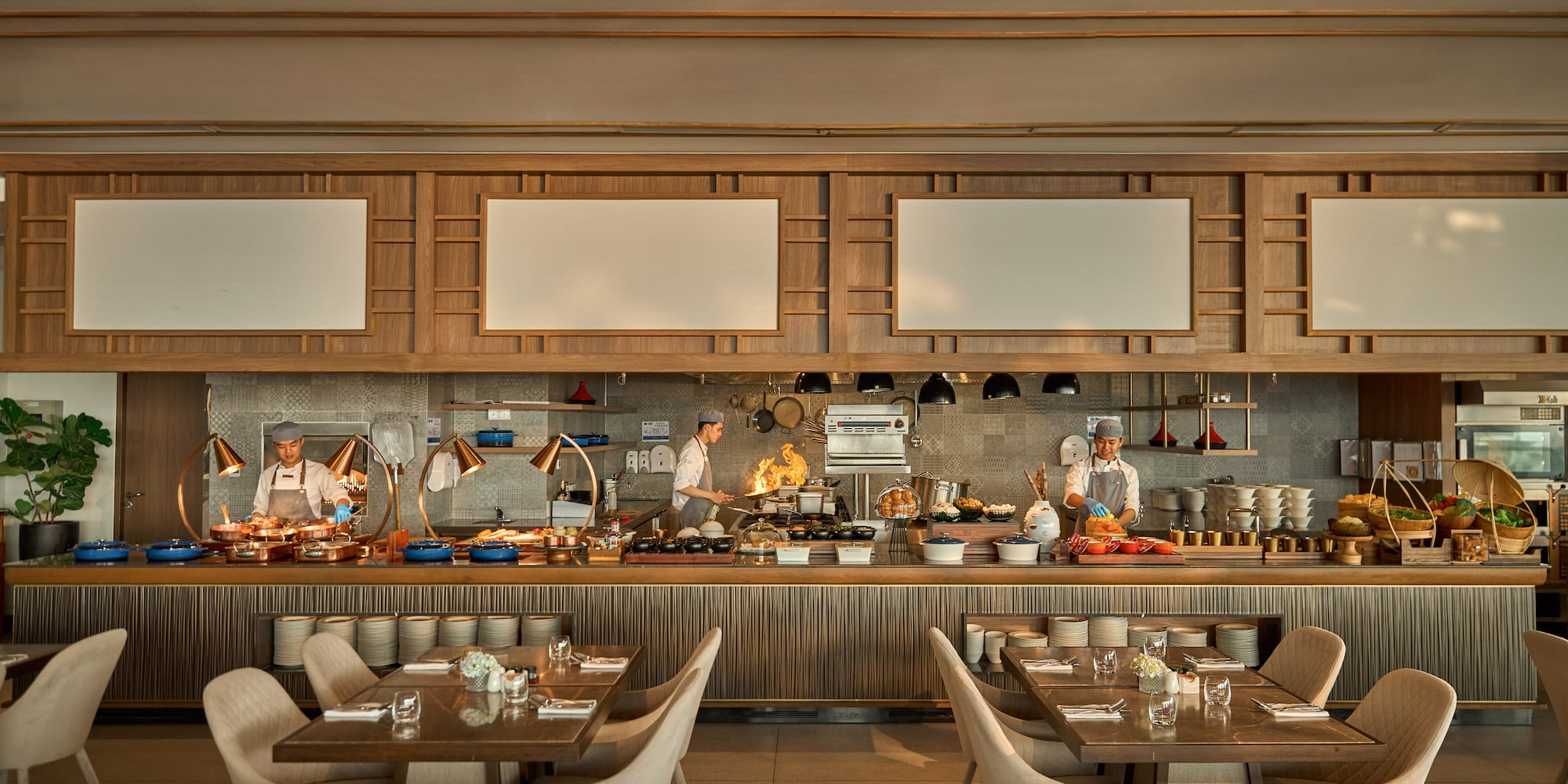 a restaurant with a chef cooking