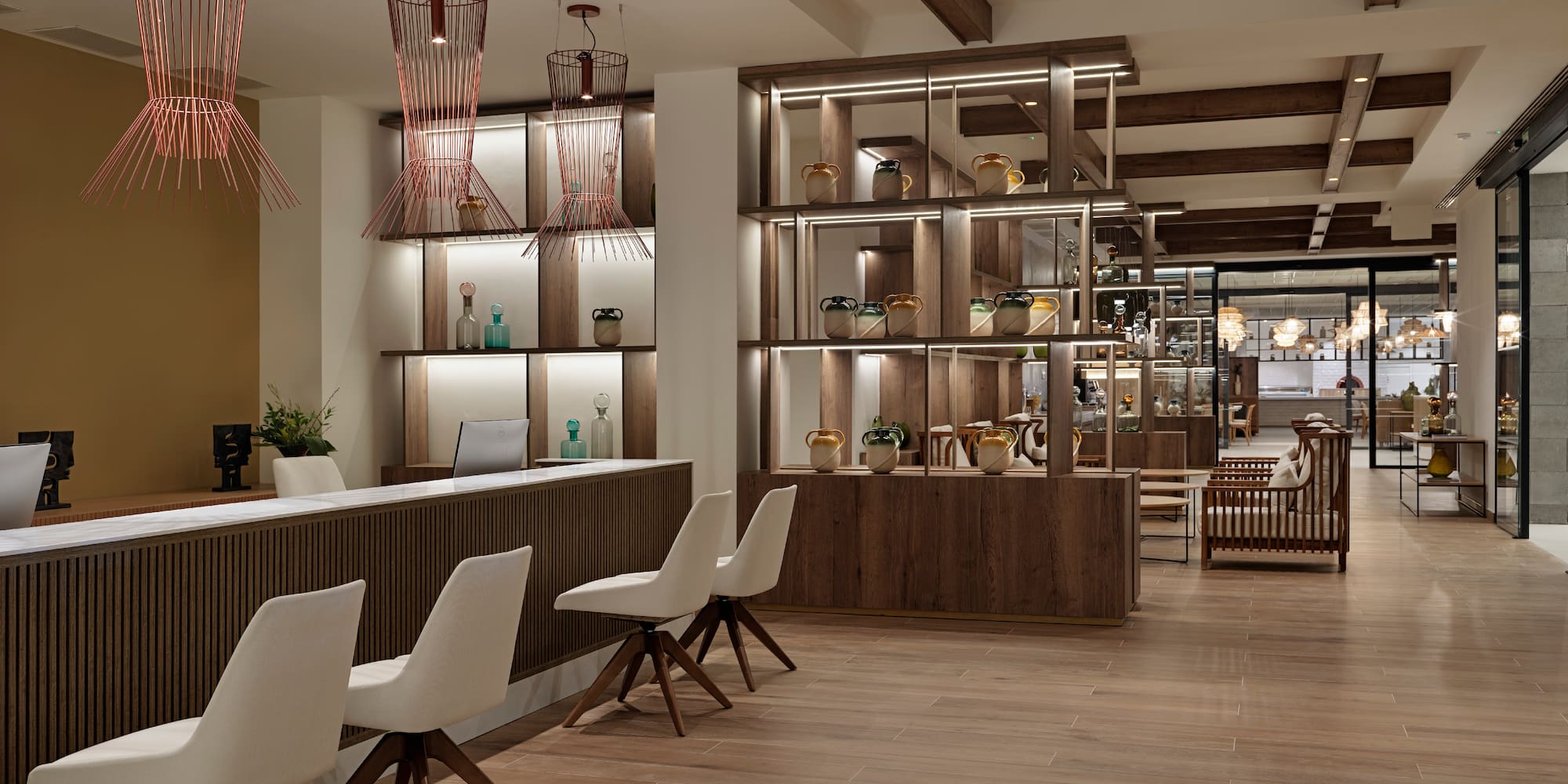 a room with a counter and chairs