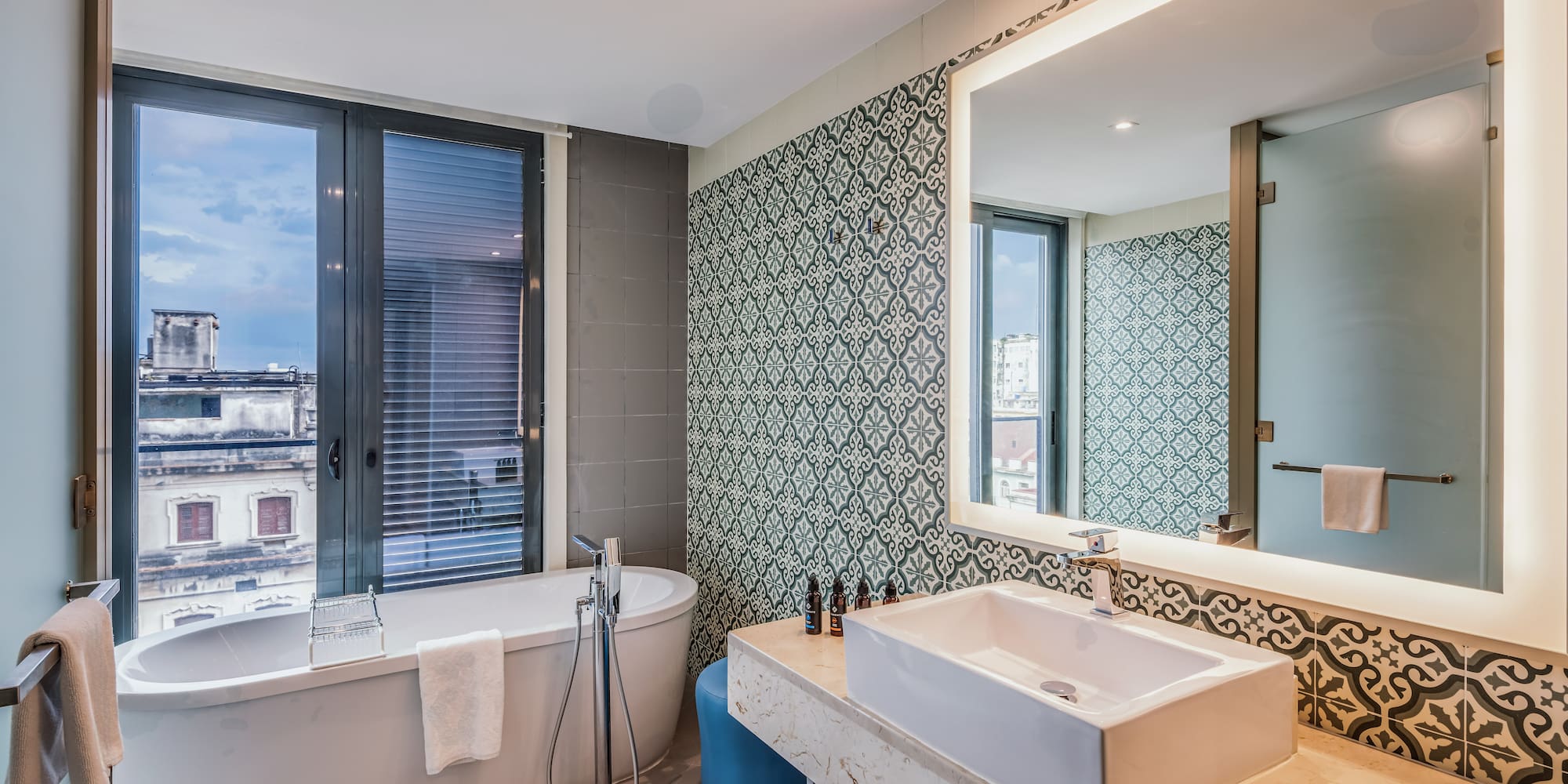 a bathroom with a tub and sink