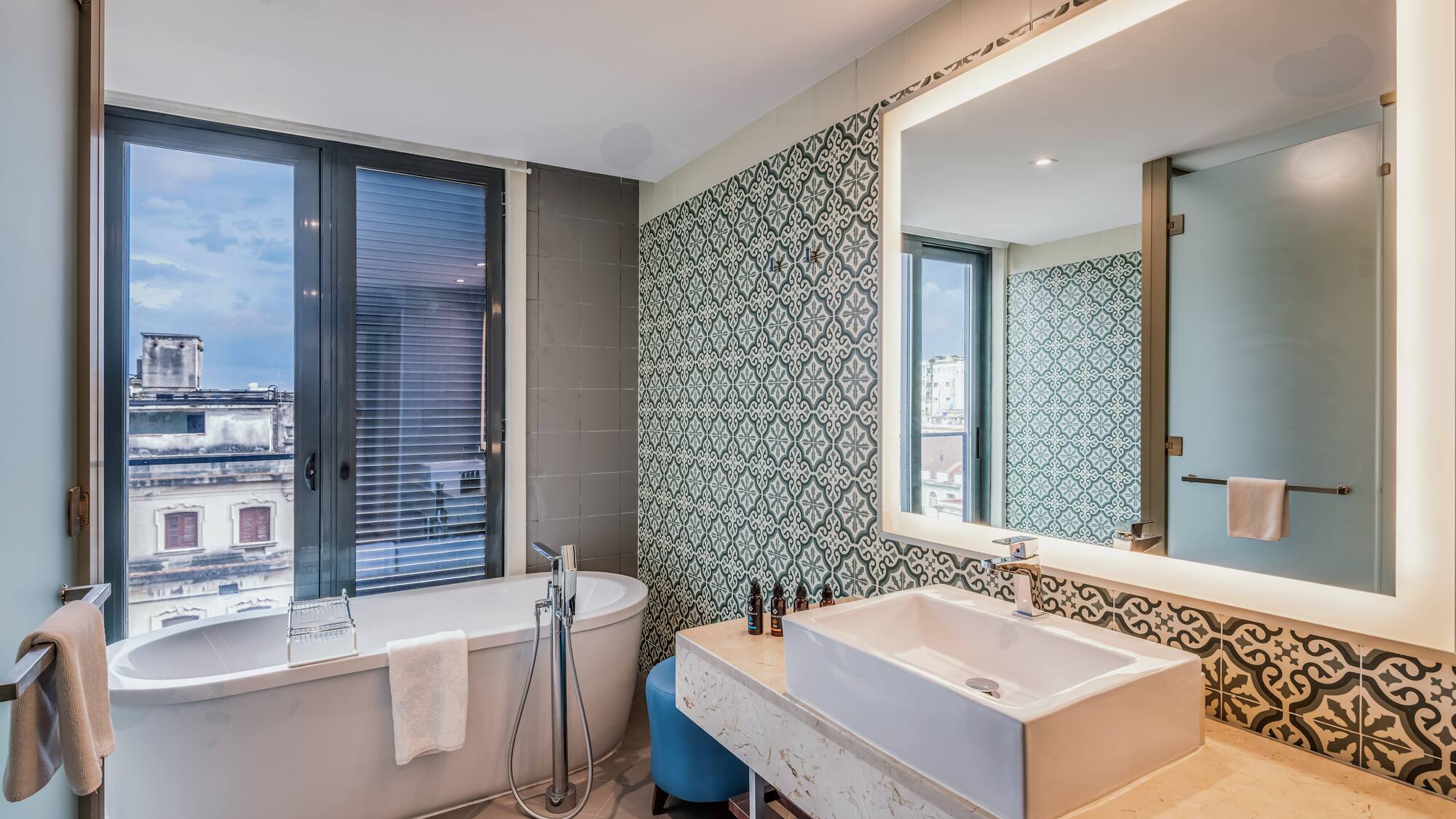 a bathroom with a tub and sink