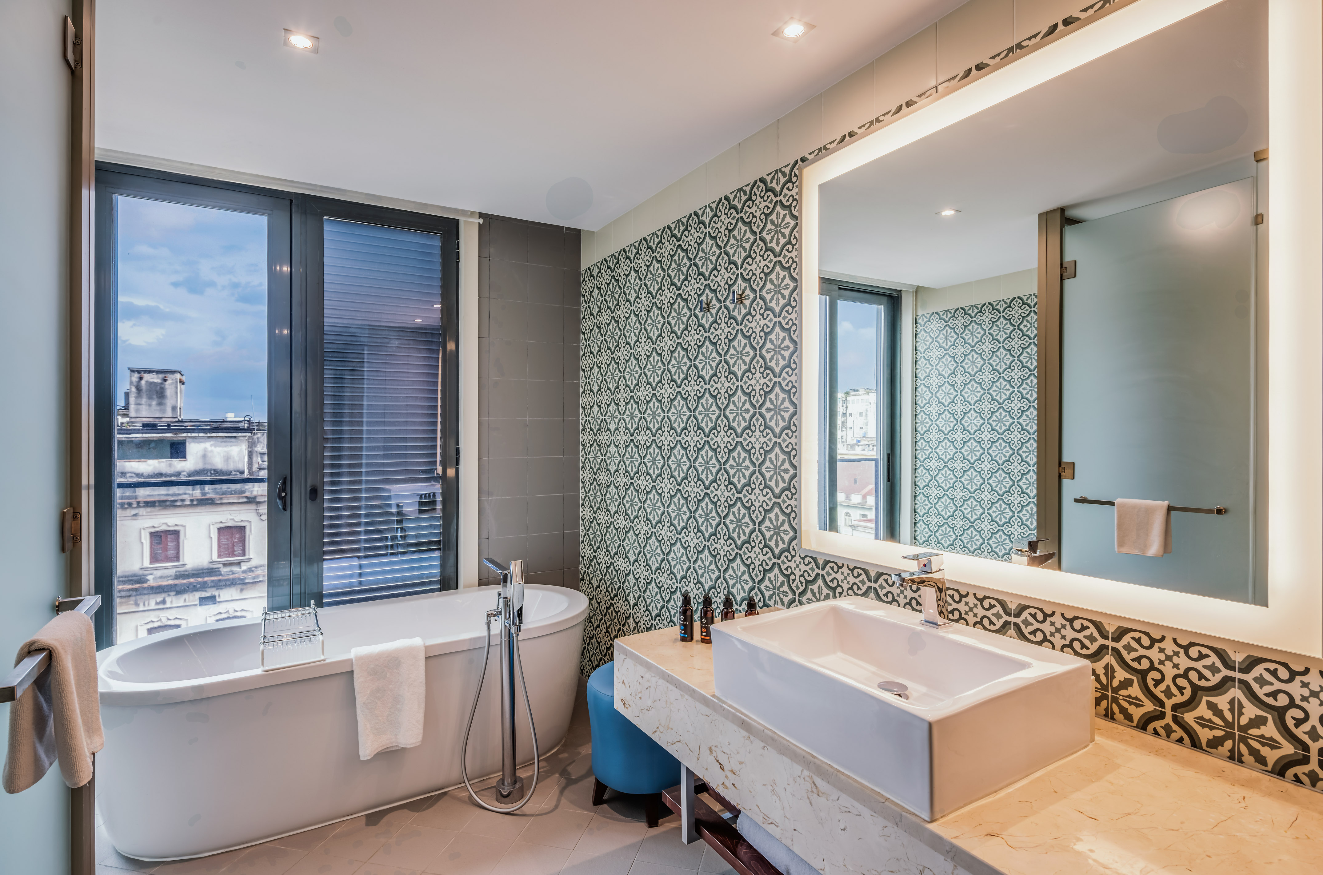 a bathroom with a tub and sink