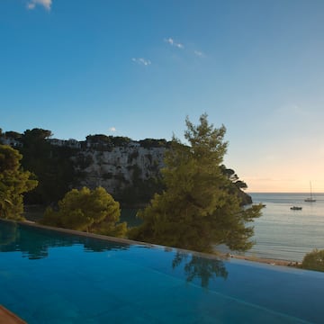 a pool overlooking a body of water