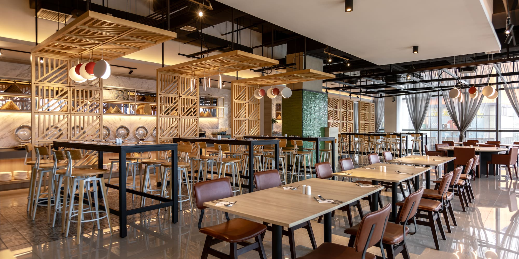 a restaurant with tables and chairs