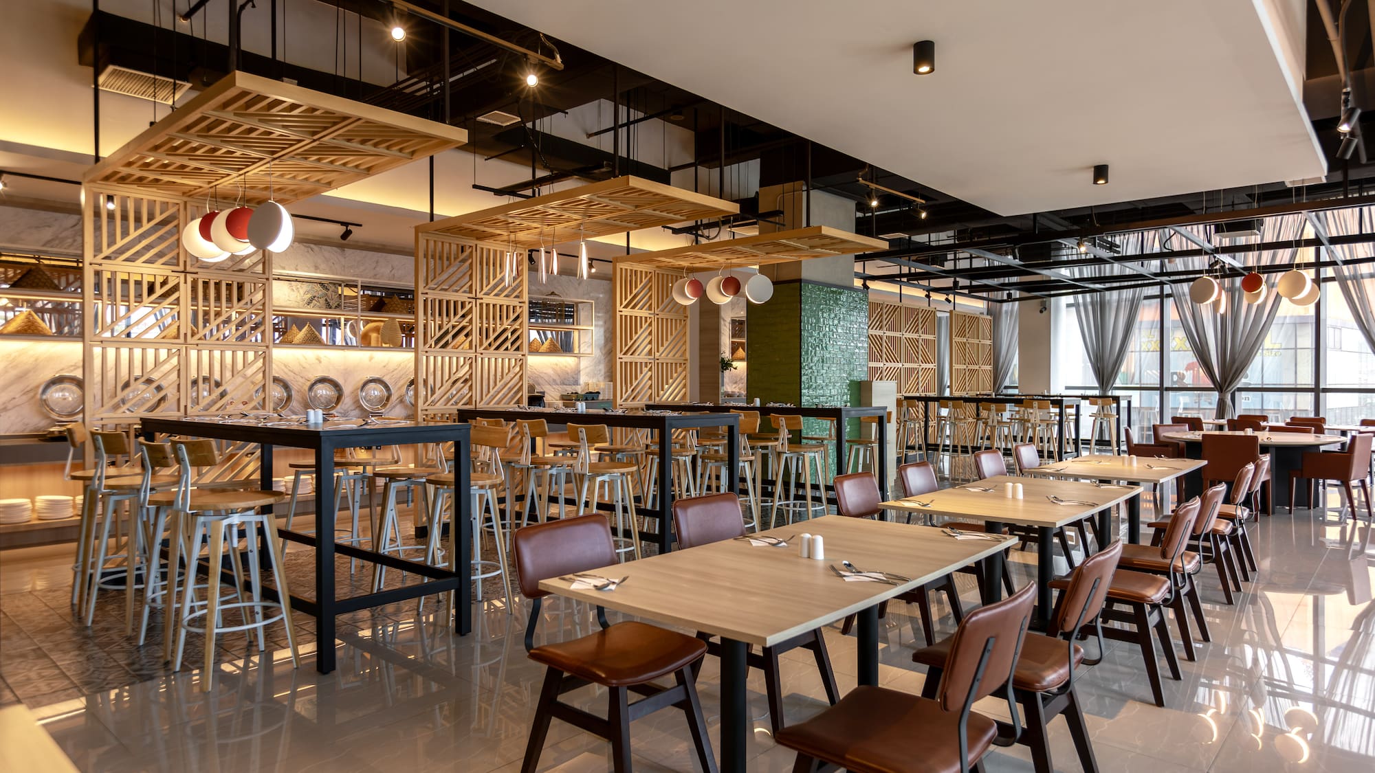 a restaurant with tables and chairs