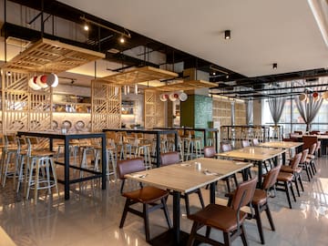 a restaurant with tables and chairs