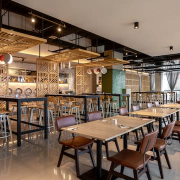 a restaurant with tables and chairs