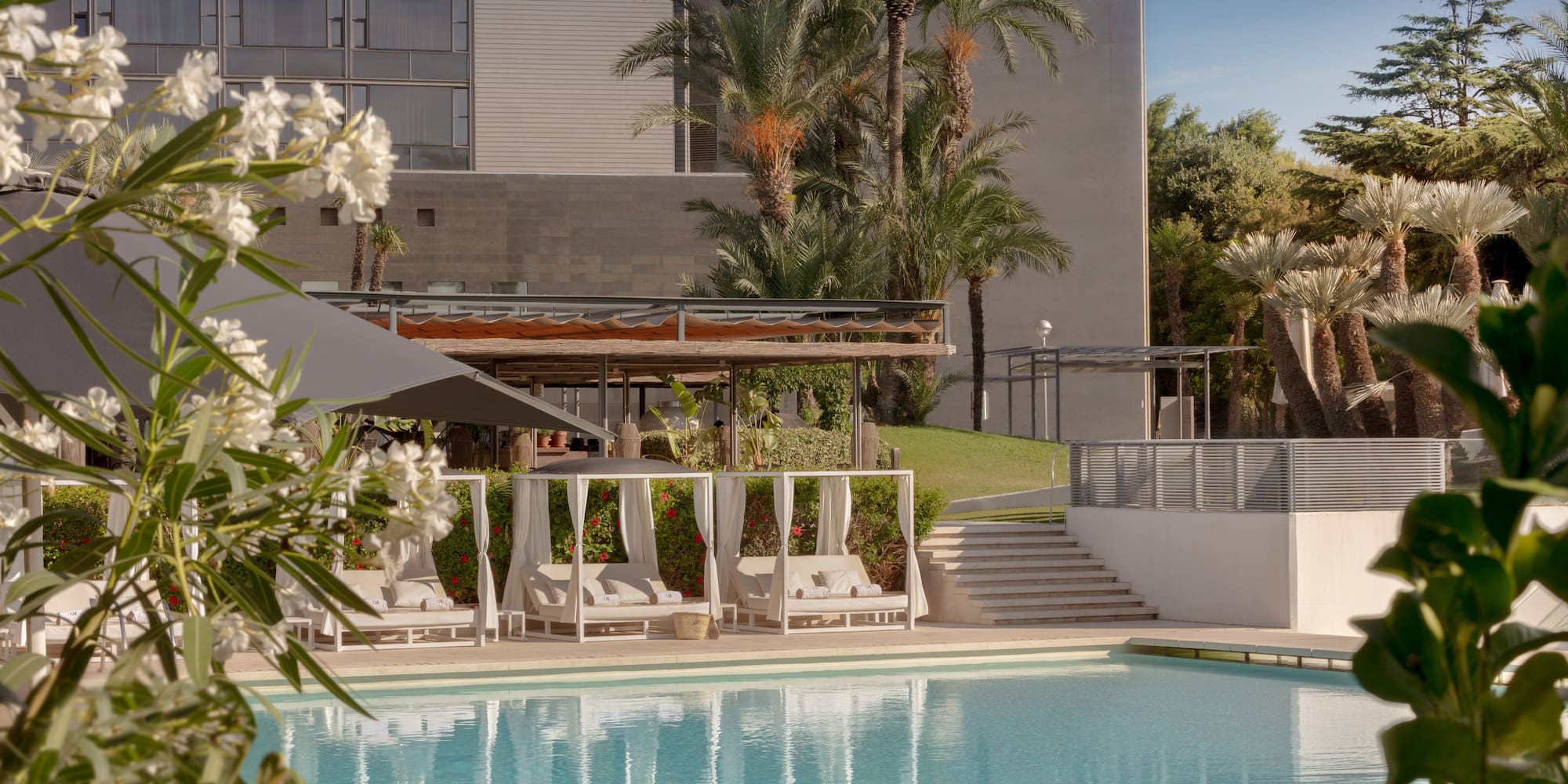 a pool with a building in the background