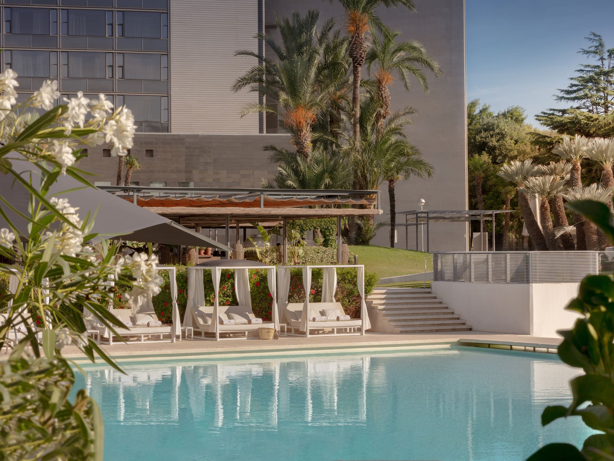 a pool with a building in the background