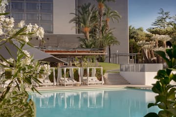 a pool with a building in the background