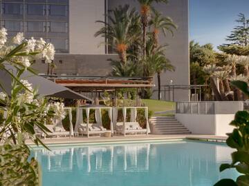 a pool with a building in the background
