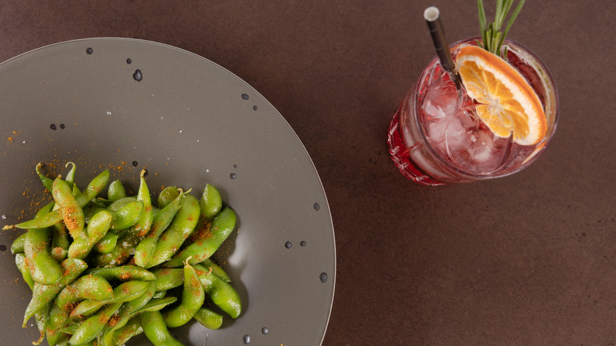 a plate of food next to a drink