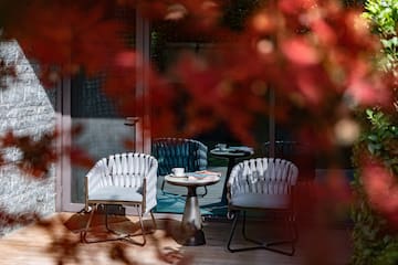 a table and chairs on a patio
