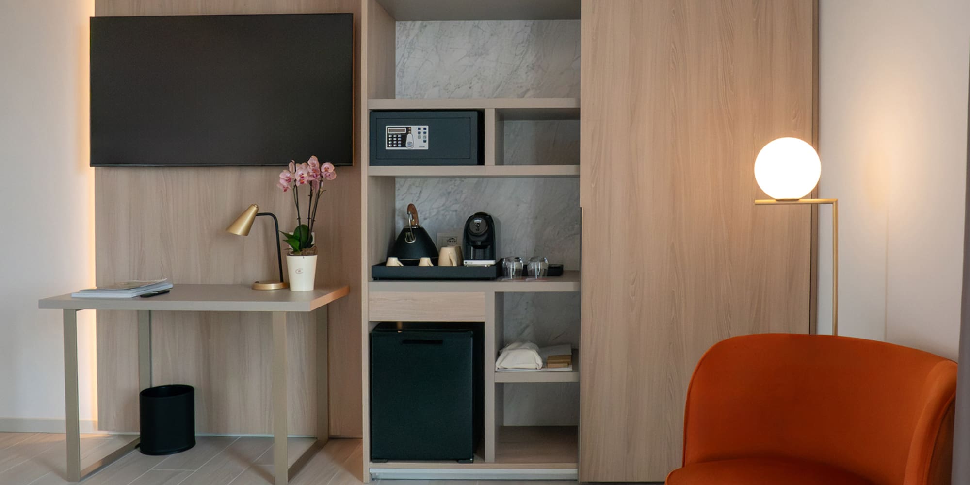 a room with a tv and a chair