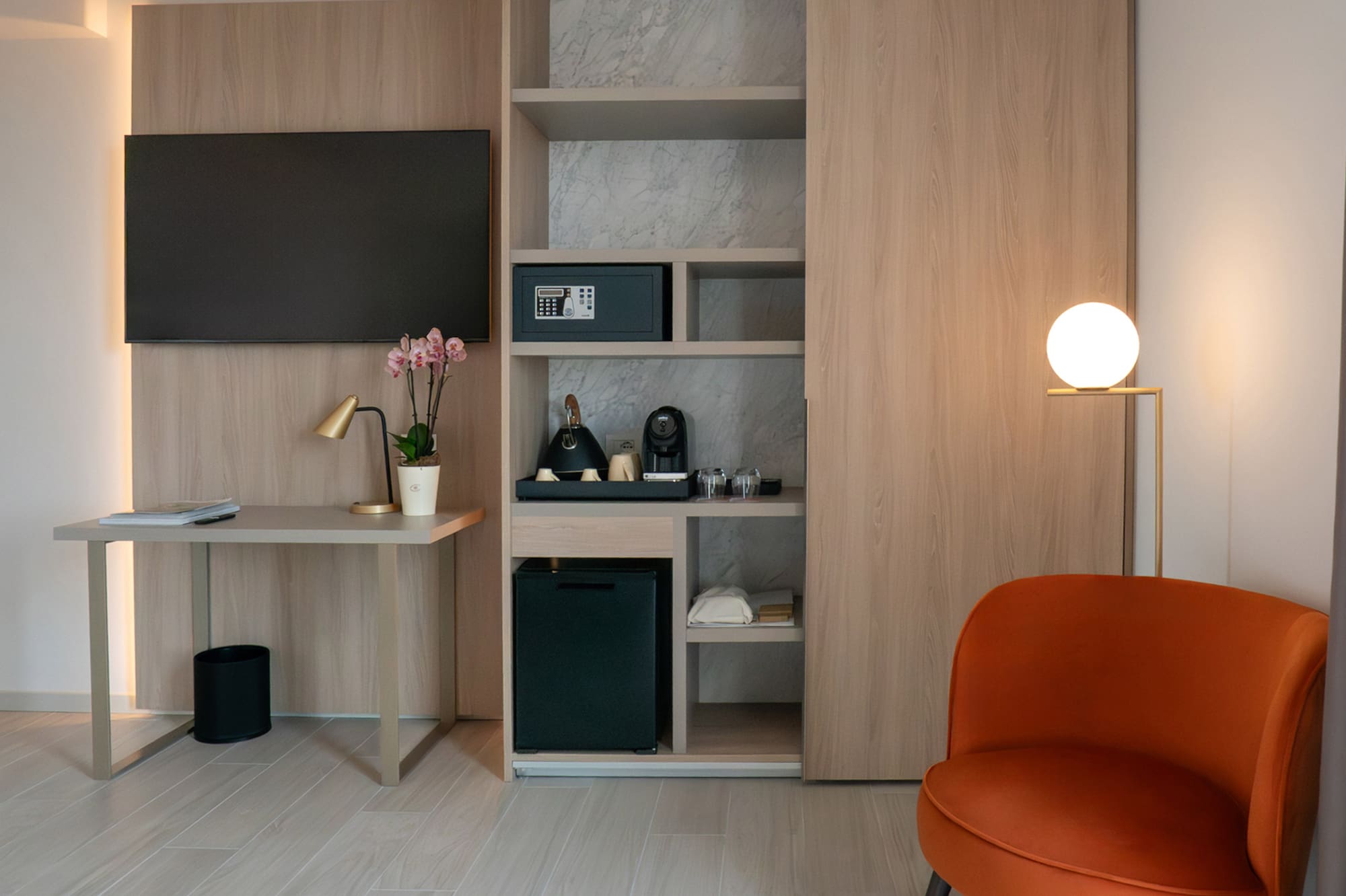 a room with a tv and a chair