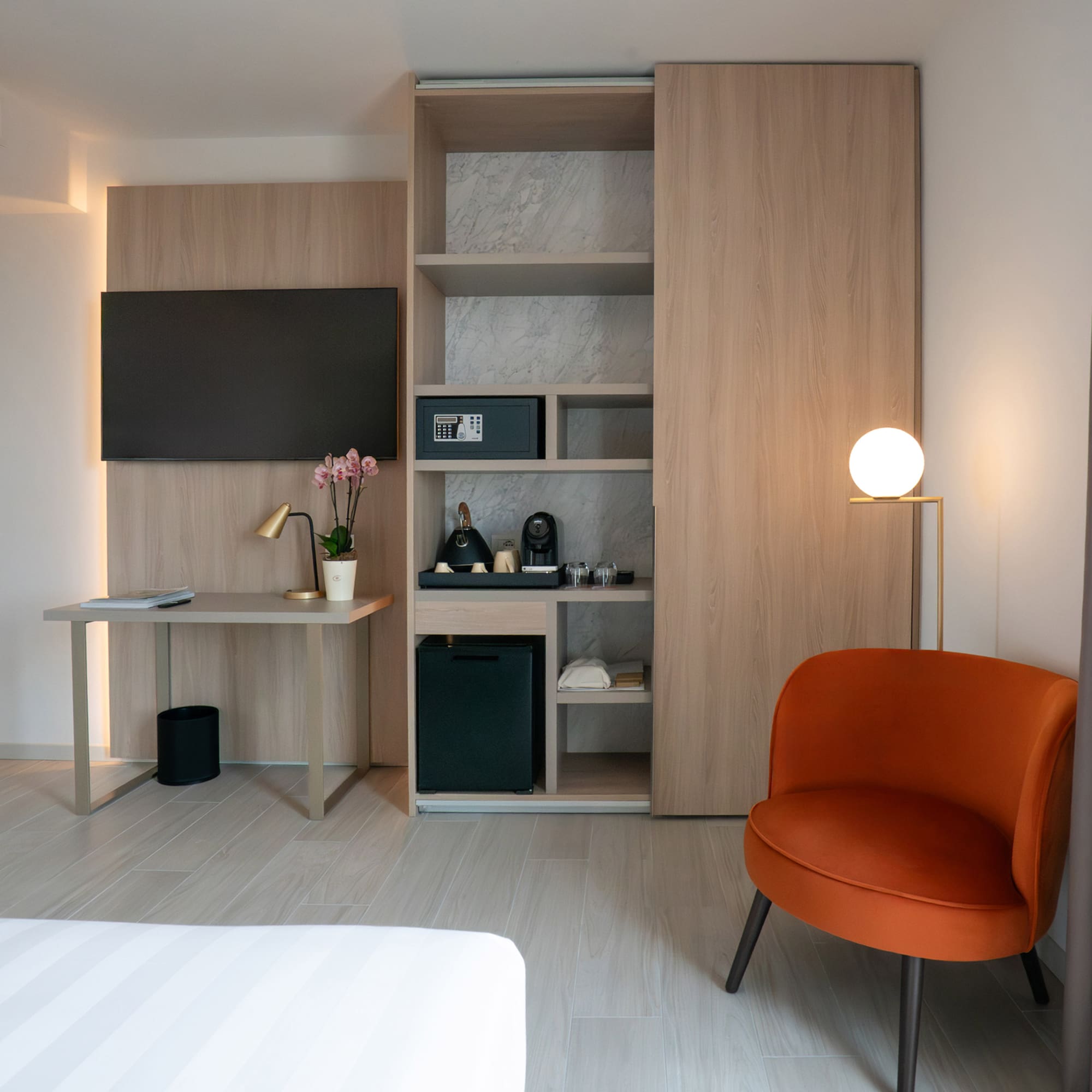 a room with a tv and a chair