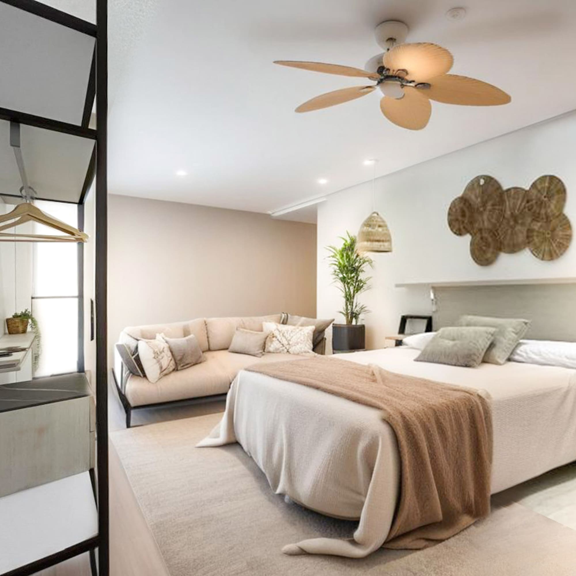 a bedroom with a large bed and a couch