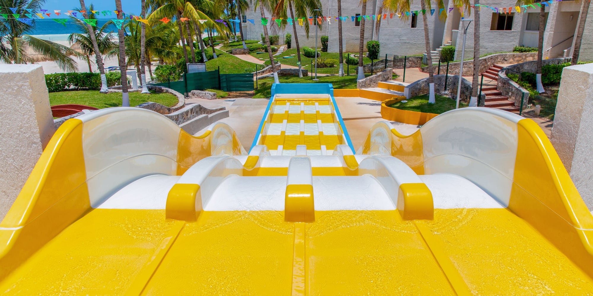 a yellow and white water slide