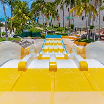 a yellow and white water slide