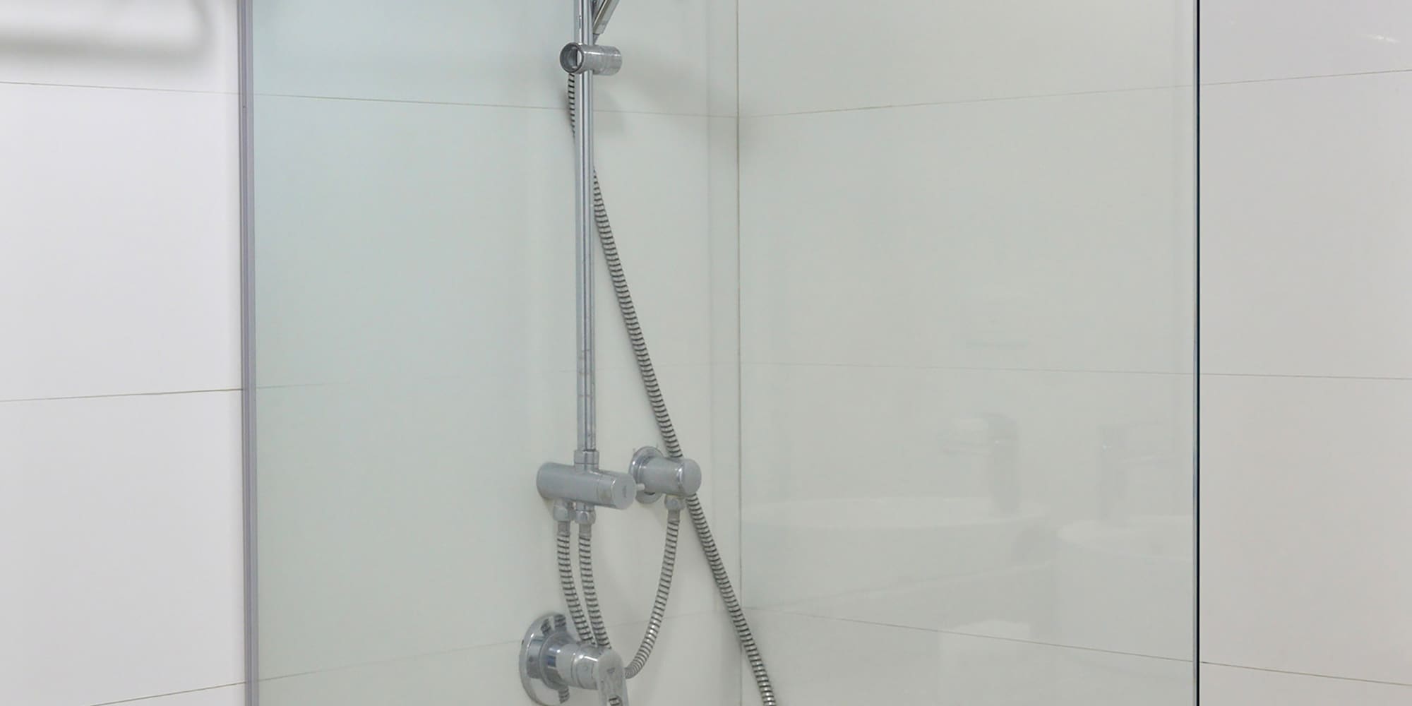 a shower with a glass door