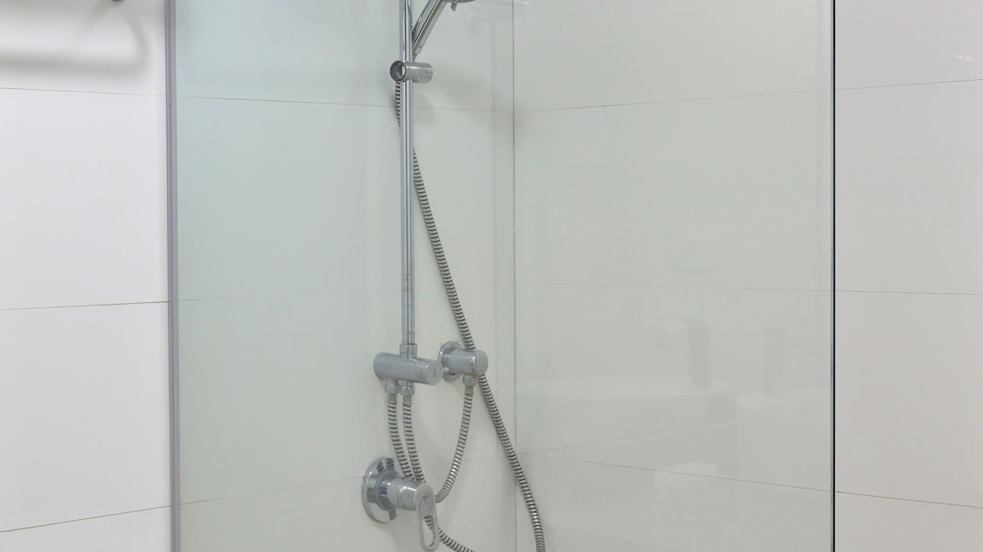 a shower with a glass door
