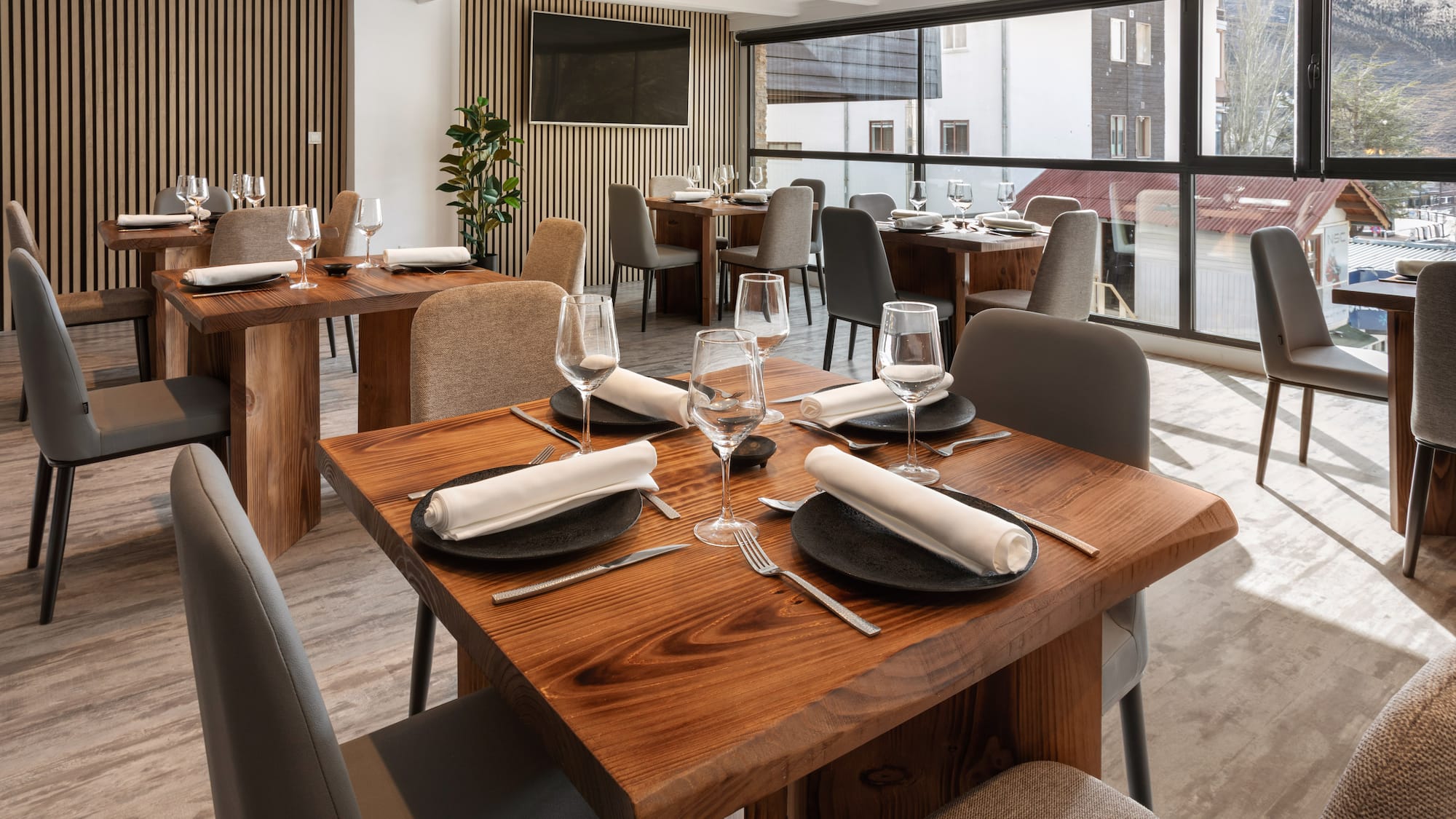 a restaurant with tables and chairs