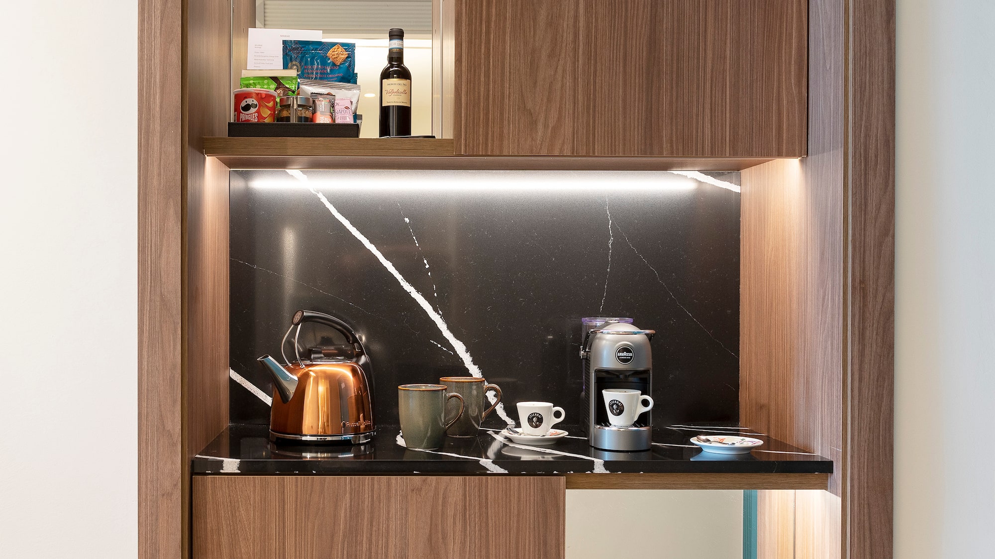 a kitchen with a counter top and a shelf