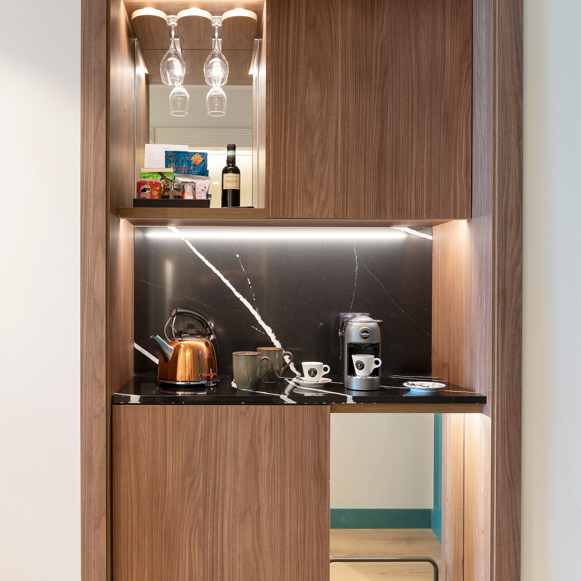 a kitchen with a counter top and a shelf