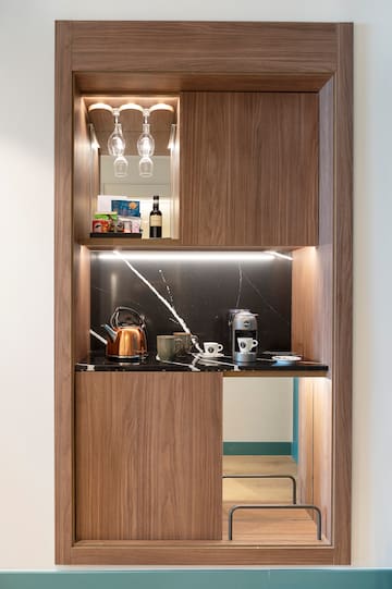 a kitchen with a counter top and a shelf