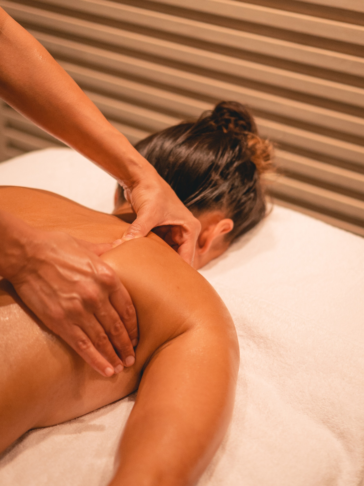 a person getting a back massage