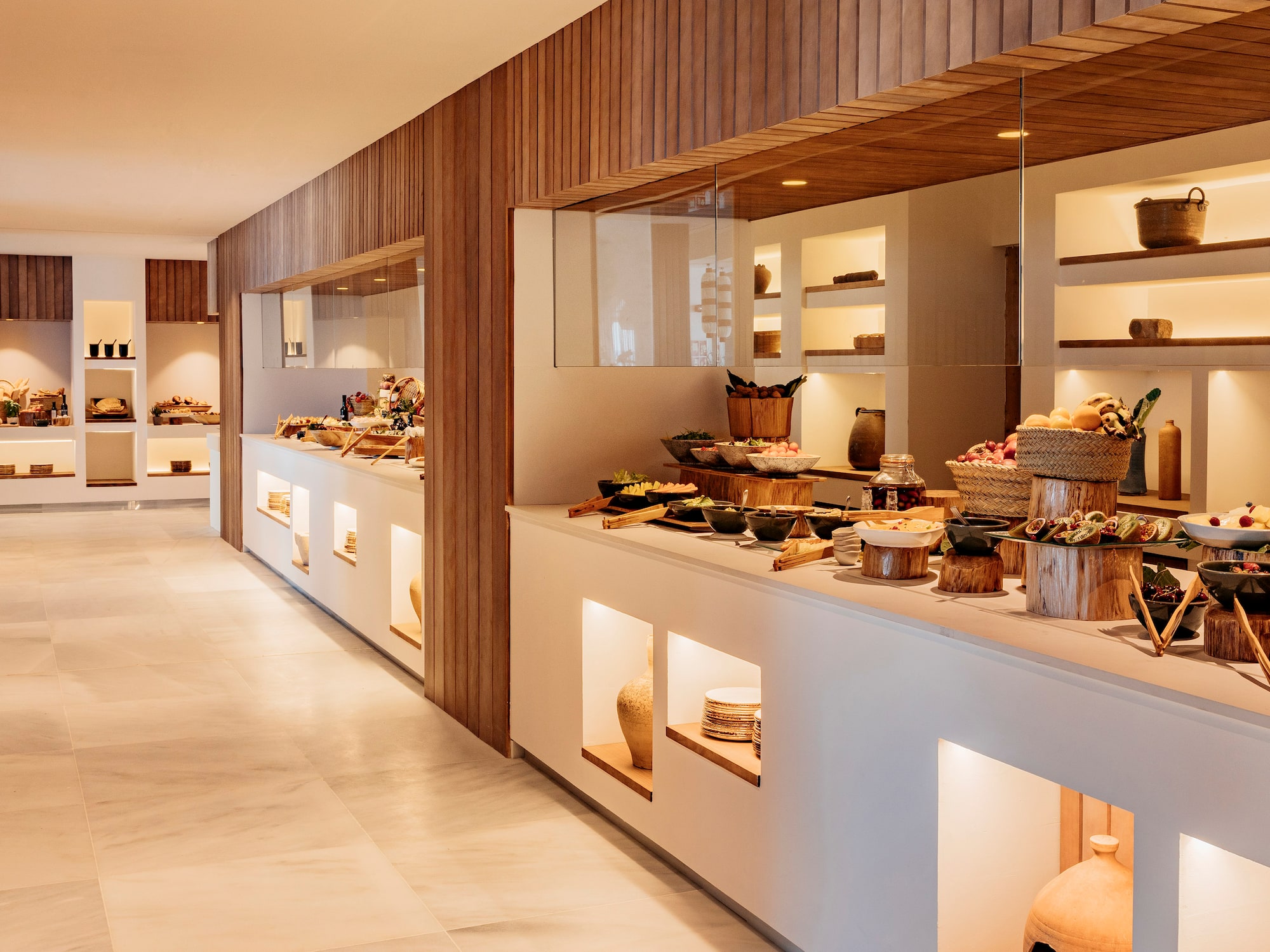 a buffet line with food on display