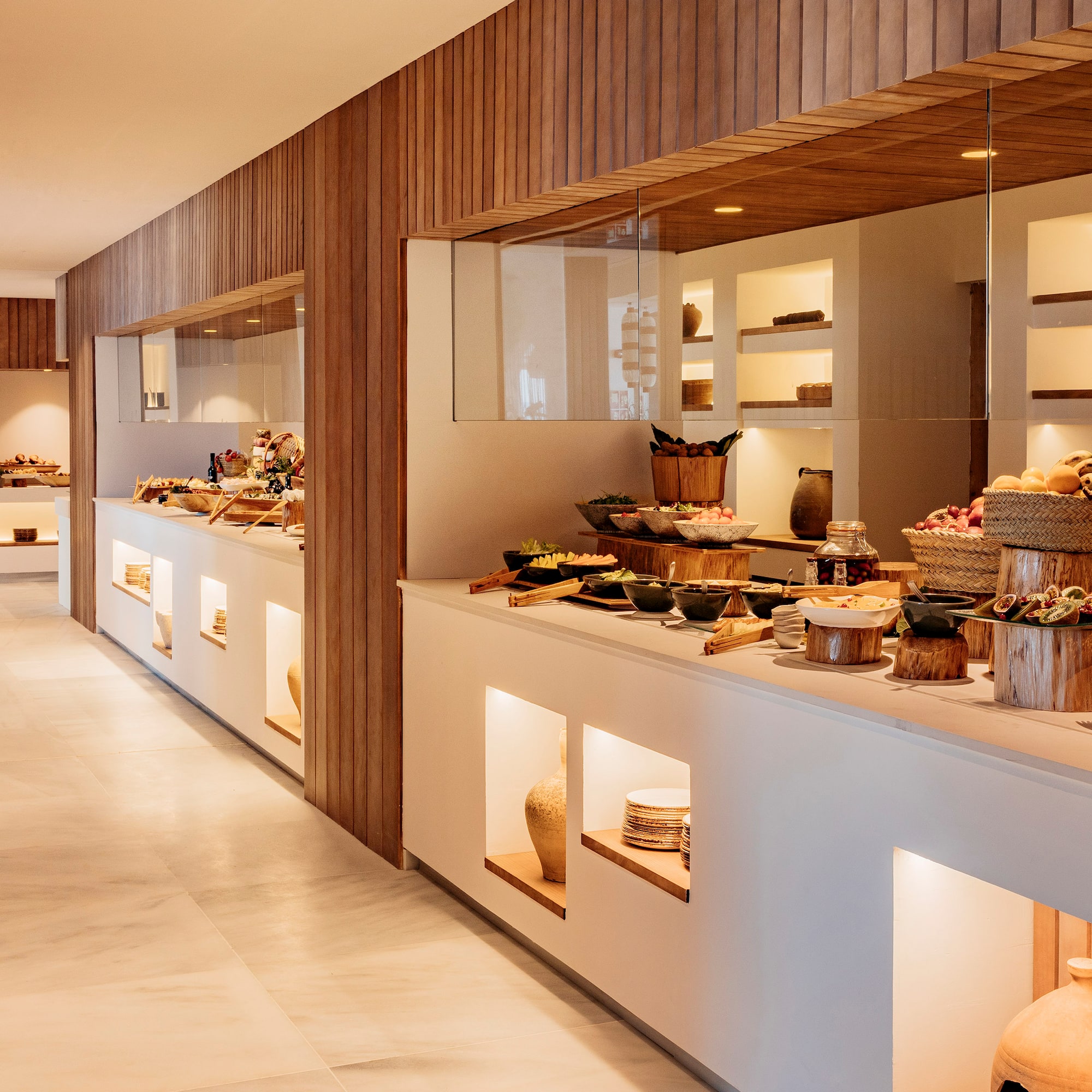 a buffet line with food on display