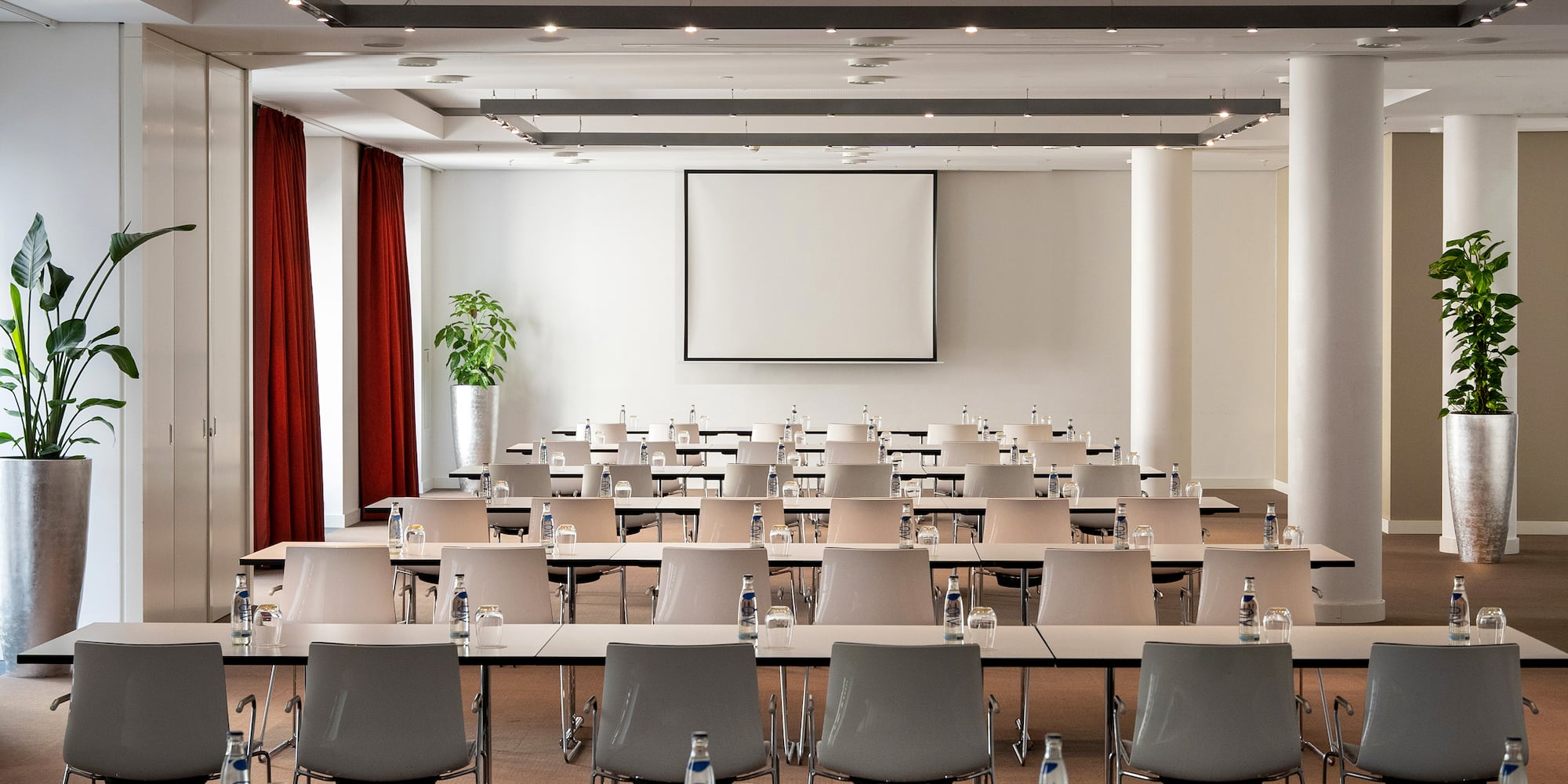 a room with tables and chairs