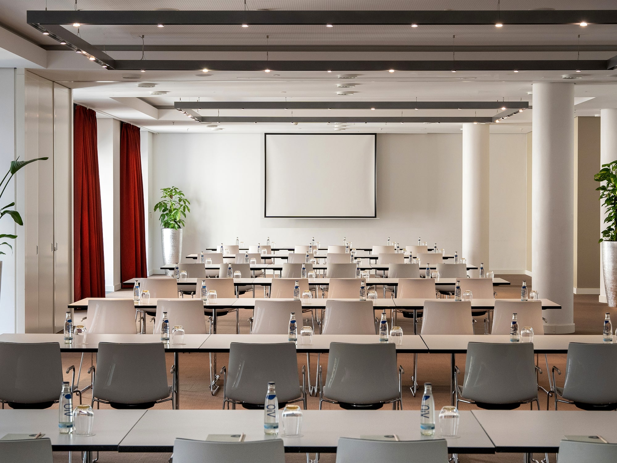 a room with tables and chairs