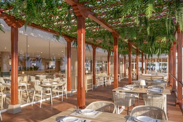 a restaurant with tables and chairs