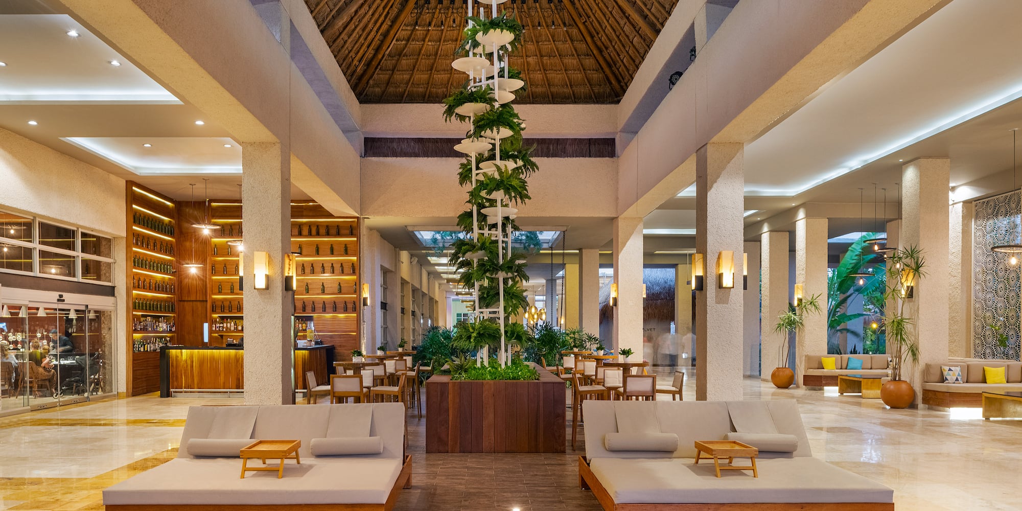 a large room with couches and chairs