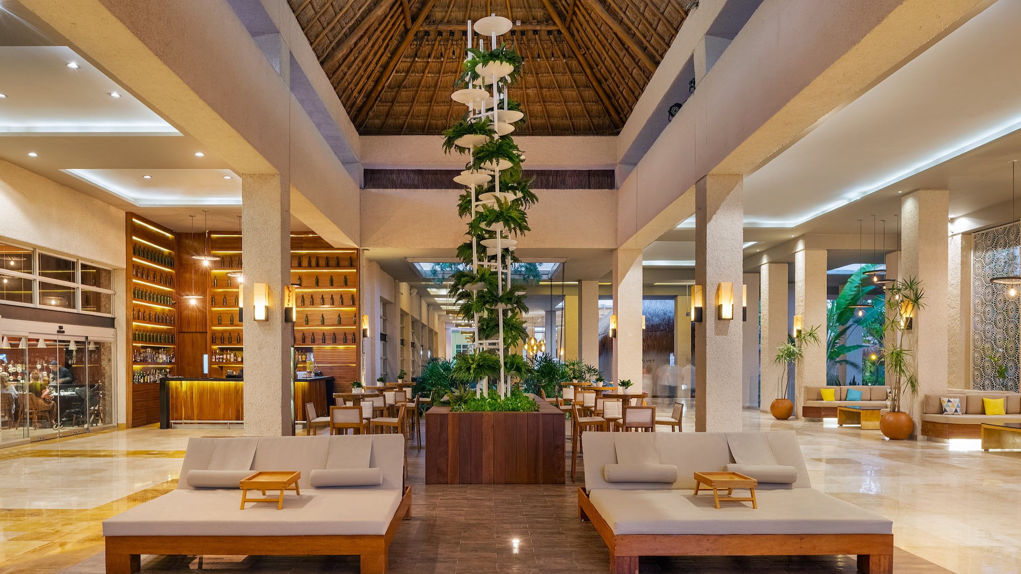 a large room with couches and chairs