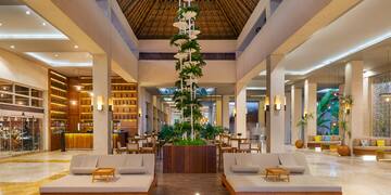 a large room with couches and chairs