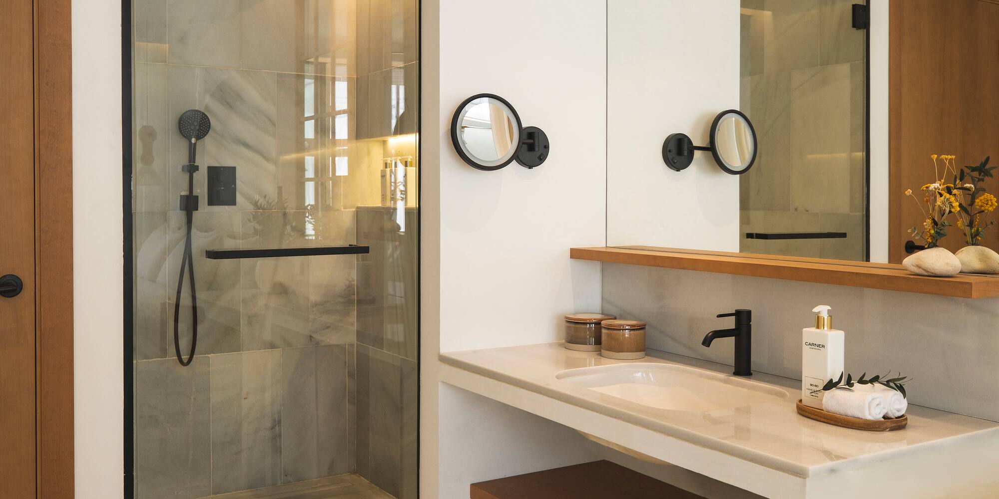 a bathroom with a shower and sink