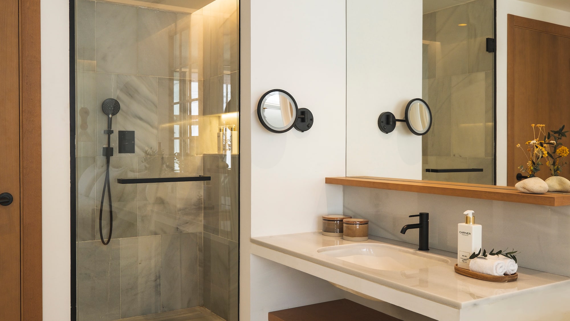 a bathroom with a shower and sink