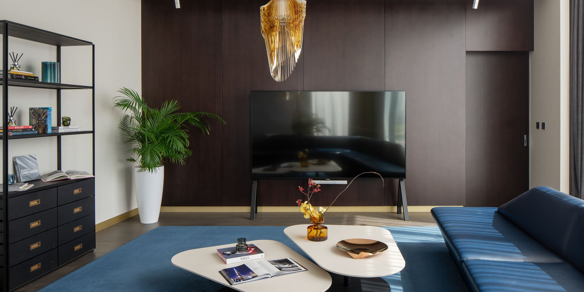 a living room with a television and a couch