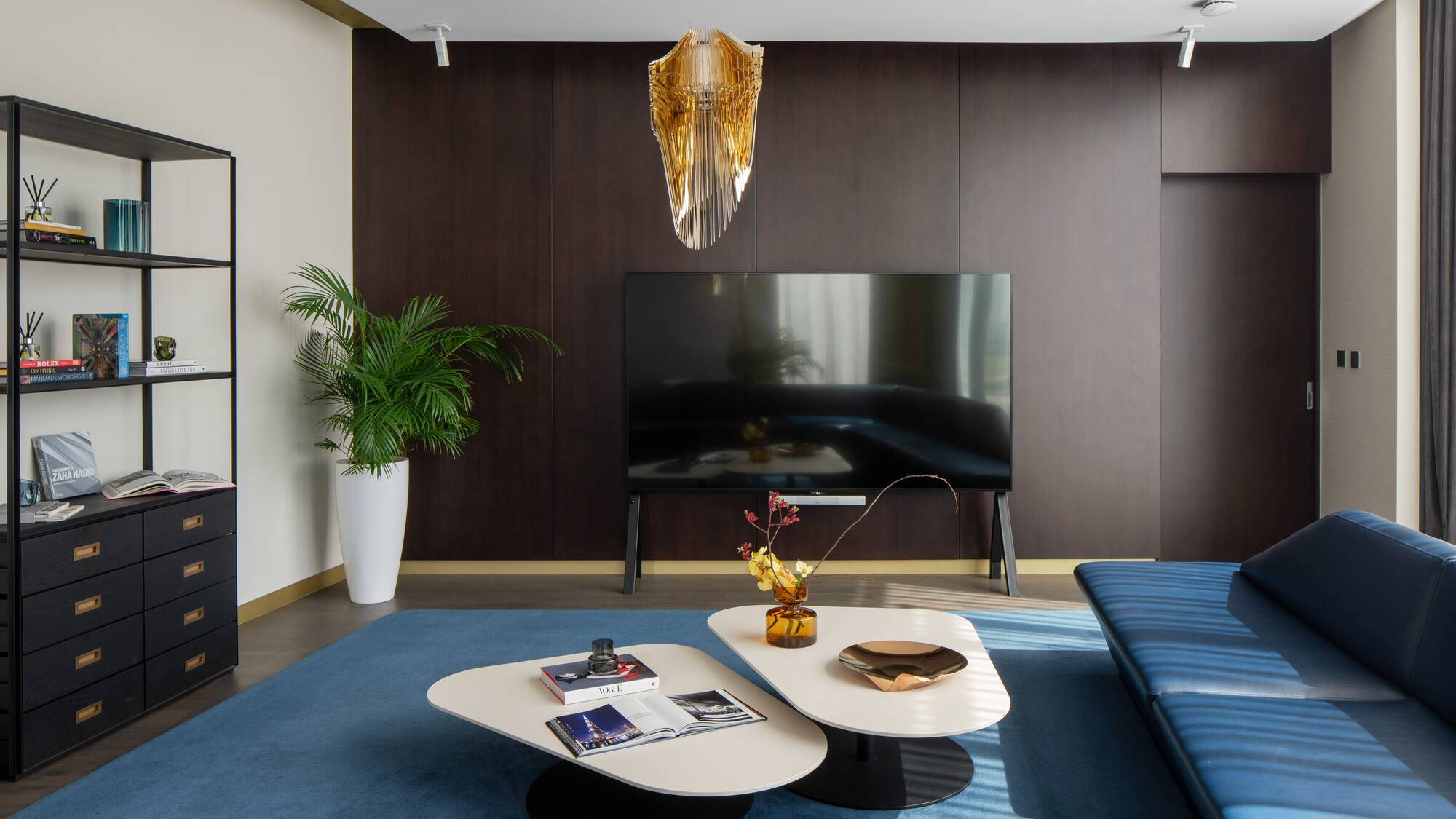 a living room with a television and a couch