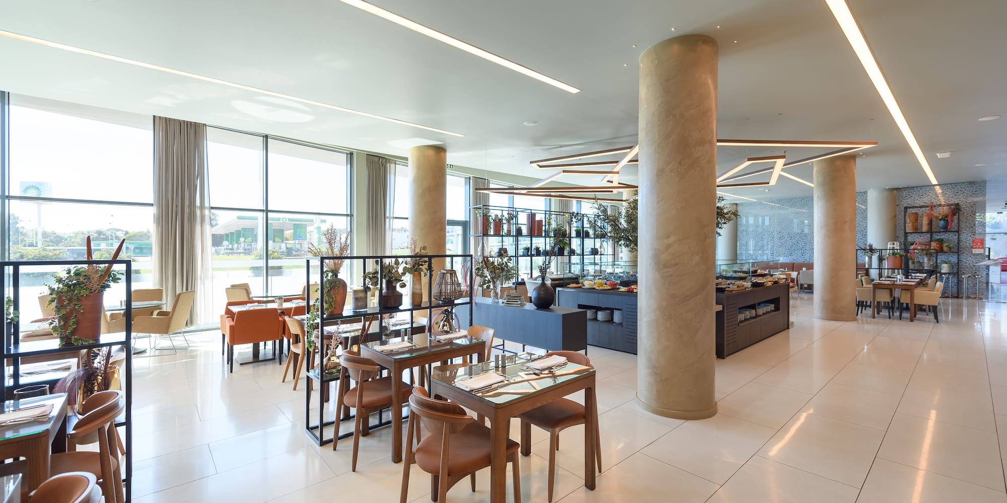 a room with a large table and chairs