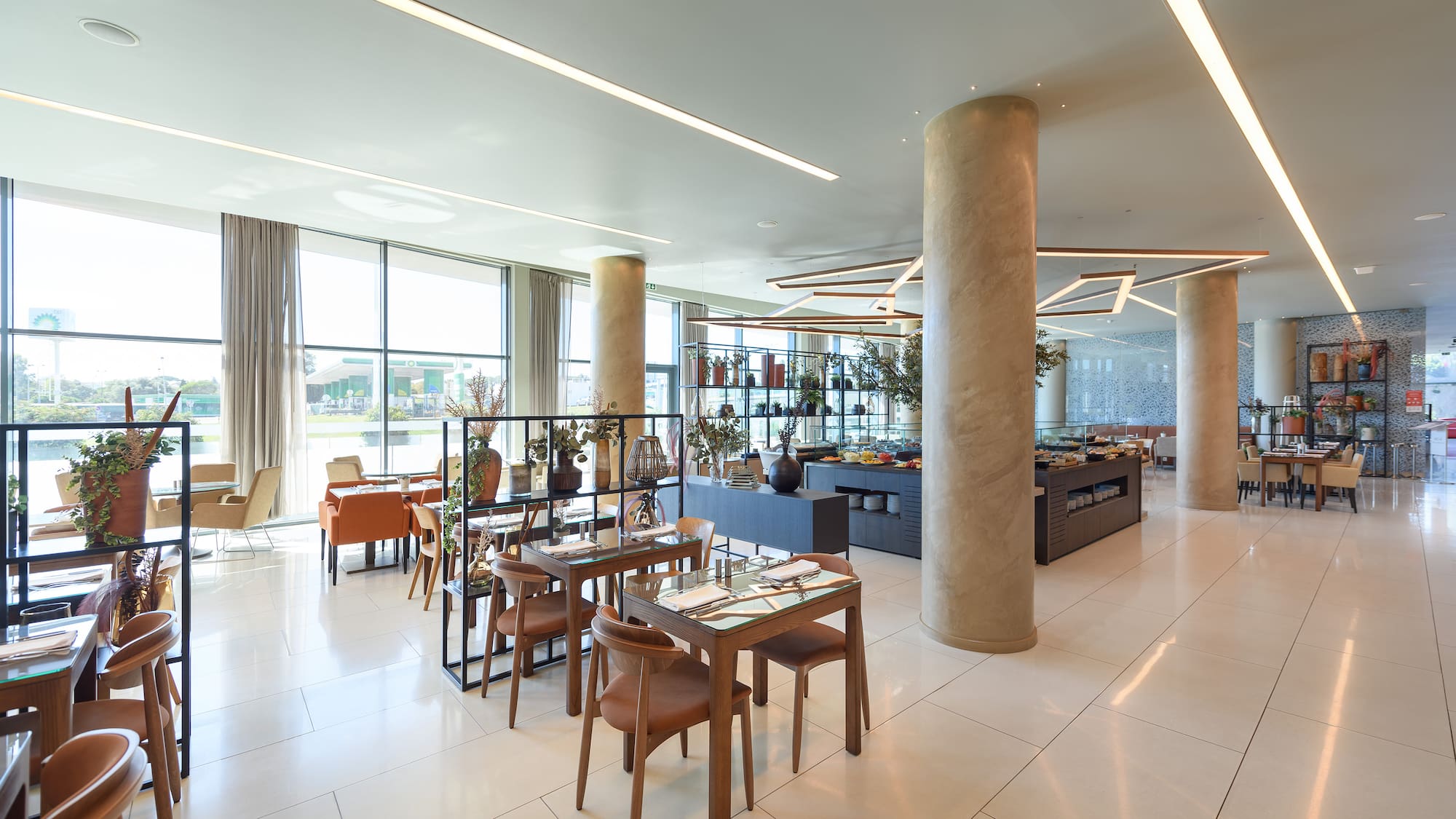 a room with a large table and chairs