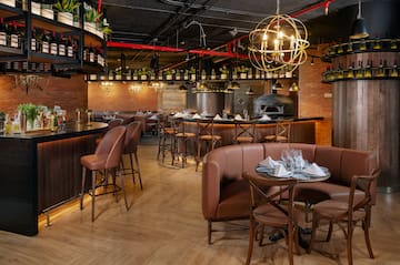 a restaurant with tables and chairs