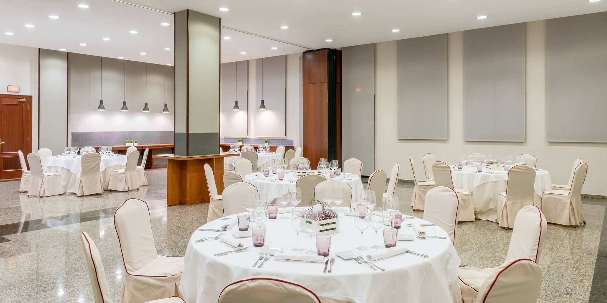 a room with tables and chairs